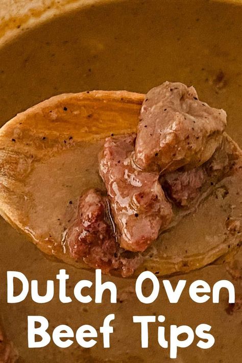 wooden spoon with Dutch Oven Beef Tips and recipe name overlay Beef Tips Dutch Oven, Beef Tips And Gravy Dutch Oven, Dutch Oven Steak And Potatoes, Beef Tips And Potatoes Oven, Dutch Oven Beef And Noodles, Dutch Oven Beef Tips, Beef Tips Oven, Beef Tips In Oven, Dutch Oven Beef Recipes