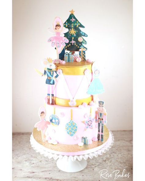 Rose Atwater on Instagram: "A Nutcracker-themed 1st birthday cake & smash! I love, love, love this pink Nutcracker design so much!! Cake flavor is Wedding Cake with Vanilla Buttercream, decorated with fondant and edible images." Nutcracker Dessert Ideas, Nutcracker Cake Ideas, Sugarplum Fairy Cake, Nutcracker Baby Shower Girl, Nutcracker Birthday Cake, Nutcracker Ballet Birthday Cake, Nutcracker Cake, Pink Nutcracker Cake, Nutcracker 1st Birthday Party Girl