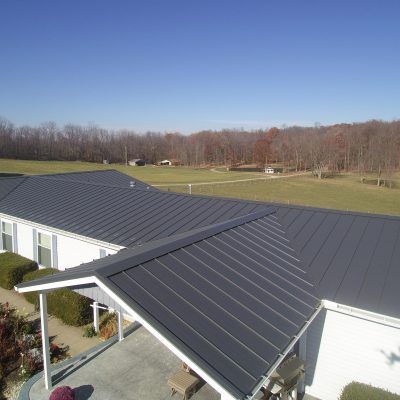 Charcoal Gray TEXTURED - Coated Metals Group Charcoal Metal Roof, Metal Roof Colors, Metal Roof Houses, Ranch House Exterior, Textured Coat, Standing Seam Metal Roof, Fibreglass Roof, Hip Roof, Roof Colors