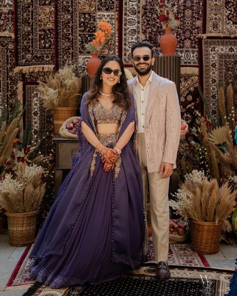 Creating the perfect setting for Sharvi and Ishaan’s mehendi was such a joy. So happy to be part of their beautiful journey. Bride- @sharvidubey Groom- @ishaankataria Decor & Design- @decorbykomal Beautiful photos- @thewhitebox.in #alsisarmahal #alsisarnahargarh #nahargarhwedding #alsisarmahal #decorbykomal #inspiredesign #weddingdecoration #shaadisaga #decorbykomal #decorationinspo #indianwedding #luxurywedding #grandwedding #goaweddingplanner #goaweddingdecor #weddingdecorator #wedding... Purple Couple Outfits Indian, Mehendi Outfits For Bride And Groom, Sangeet Couple Outfits, Couple Indian Outfits, Groom Engagement Outfit Indian, Engagement Couple Outfits Indian, Indian Wedding Dresses For Bride, Mehendi Dress Outfits, Engagement Outfits Indian Couple