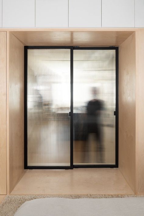 Ribbed glass door! post: Brooklyn Loft Renovation by Dean Works. via Dwell Ribbed Glass Doors, Fluted Glass Partition Sliding Doors, Ribbed Glass Sliding Door, Ribbed Glass Partition, Glass Wall With Door, Fluted Glass Sliding Door Kitchen, Fluted Sliding Door, Fluted Glass Sliding Door, Glass Wall Kitchen