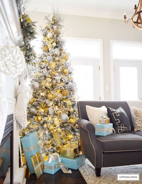 HOLIDAY HOME SHOWCASE 2016 | Silver and gold elegant Christmas tree accented with tiffany blue and gold gifts. #christmasdecor Yellow Christmas, Holiday Greenery, Elegant Christmas Trees, Christmas Decor Inspiration, Gold Holiday, Christmas Tree Inspiration, Gold Christmas Tree, Christmas Tablescapes, Christmas Mantels