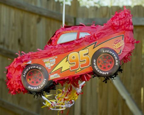 Disney Cars Double Birthday  | CatchMyParty.com Children Birthday Party Ideas, Cars Party Ideas, Piñata Cars, Car Pinata, Disney Cars Birthday Theme, Lightning Mcqueen Birthday Cake, Disney Cars Theme, Pixar Cars Birthday, Birthday Pinata