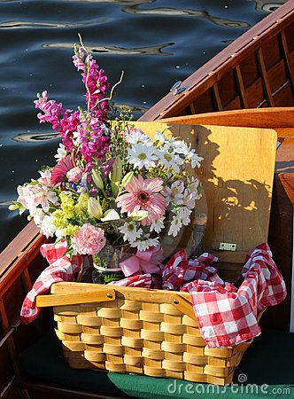 Picnic Basket With Flowers - On A Wooden Boat Picnic Basket Centerpiece, Wedding Centerpieces Floral Arrangements, Picnic Centerpieces, Wedding Centerpieces Floral, Picnic Event, Bbq Birthday, Basket With Flowers, Picnic Vibes, Luncheon Ideas