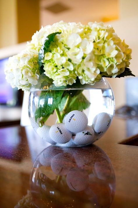 Golf birthday party centerpiece made with a glass vase, green hydrangea, and golf balls. Golf Centerpieces, Golf Theme Party, Golf Party Decorations, Golf Ball Crafts, Golf Wedding, Golf Birthday Party, Golf Decor, Golf Event, Golf Outing