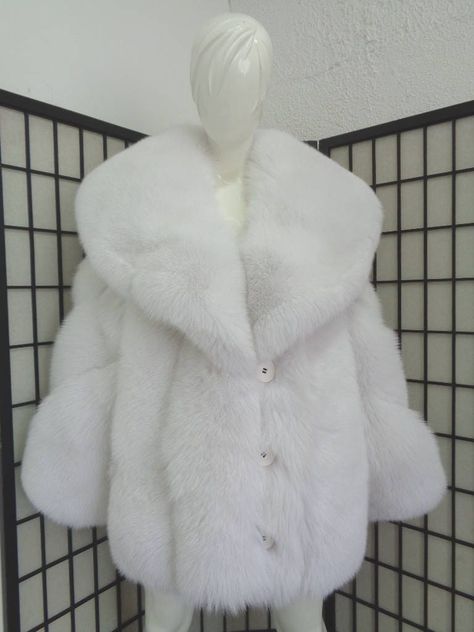 BEAUTIFUL & VERY STYLISH NATURAL WHITE FOX FUR JACKET FOR WOMEN, MADE FROM FULLY LET OUT SKINS; THE BEST! THE COLLAR IS "SHAWL" TYPE AND VERY BIG. THE SLEEVES ARE DIAGONAL, IT CLOSES WITH BUTTONS AND HAS TWO SIDE POCKETS. THIS ITEM IS BRAND NEW/MADE TO MEASUREMENT! AFTER BUYING THIS ITEM, IT WOULD BE VERY MUCH APPRECIATED IF YOU COULD PROVIDE YOUR HEIGHT, WEIGHT AND BUST CIRCUMFERENCE, SO WE CAN MAKE THE COAT TO YOUR SIZE.  MEASUREMENTS:   *SIZE: WILL BE MADE TO MEASUREMENT *LENGTH: 30"  *SLEEVE Couture, Big Jacket Outfits, White Fluffy Coat, Cropped Fur Jacket, White Faux Fur Coat, Fox Fur Scarf, White Fur Coat, Jacket Outfit Women, Womens Faux Fur Coat