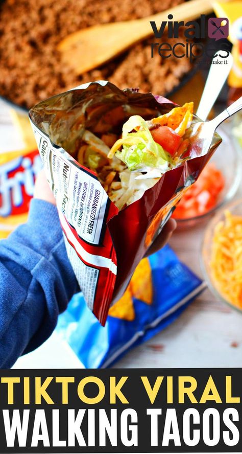 Walking Tacos with Doritos or Fritos, a delicious Mexican night with taco toppings all served in a snack size chip bag. Easy viral with over 45 million views and 3.5 million hearts - This quick meal with a short cook time of 15 minutes is all you need. Just grab mini bags of corn chips and bowls of toppings for a customized Taco Tuesday that everyone will love! #walkingtacos #tacorecipe @EasyViralRecipes #viralrecipes #tiktokRecipes Dorito Nachos In A Bag, Fritos Taco Bowls, Mexican Chips, Dorito Chip, Fritos Corn Chips, Taco Toppings, Brisket Tacos, Viral Recipes, Mexican Night