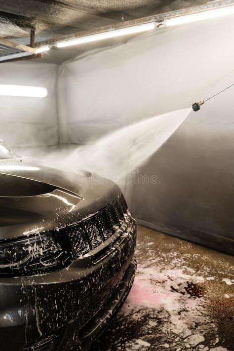 Cleaning the car body with a high pressure water jet at a self serve car wash. Washing the foam from the surface of the stock image Self Serve, Car Body, Water Jet, Car Cleaning, Car Wash, Vector Background, High Pressure, Hobbies, Stock Images