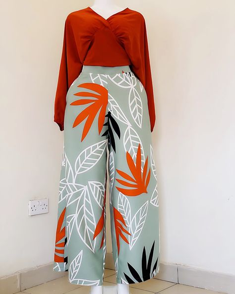 Made in Uganda palazzo pants . KAMU KAMU plaza FF 18 first floor. +256706014499 60,000ugx Palazzo Patterns For Women, Ankara Palazzo Pants, Palazzo Pants Outfit Casual, Palazzo Pants Outfit, Floral Skirt Outfits, Island Wear, Corporate Dress, Long Gown Dress, Modest Fits