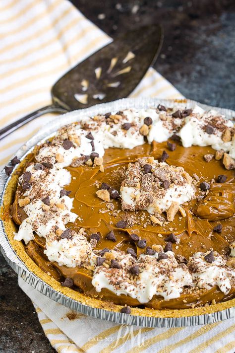 O'Charley's Caramel Pie Recipe has a buttery graham cracker crust, thick rich caramel dulce de leche, whipped cream and chocolate. Copycat O'charleys Caramel Pie, Copycat Ocharleys Caramel Pie, Copycat O’charley�’s Caramel Pie, O’charleys Caramel Pie, Ooey Gooey Caramel Pie, Carmel Cream Pie Recipe, Chocolate Caramel Pie Recipes, Ocharleys Caramel Pie Recipes, Carmel Pie Easy