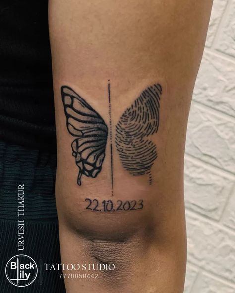 Customized Butterfly Fingerprint Tattoo The combination of butterfly and fingerprint signifies a merging of personal transformation or growth with individual identity. The birthdate adds a personal touch, representing an important milestone or a significant event in the person's life. #buterfly #buterflytattoo #fingerprint #fingerprinttattoo #tattoo #tattoolover #tattoos #tattoo #blacklily_tattoo #halol #vadodara #bhavnagar #gujrat Memorial Tattoo With Fingerprint, Butterfly Thumbprint Tattoo, Butterfly Elephant Tattoo, Tattoos With Fingerprints, Thumbprint Memorial Tattoo, Finger Print Butterfly Tattoo, Butterfly Fingerprint Tattoo, Finger Print Tattoo Memorial, Thumbprint Tattoo Memory