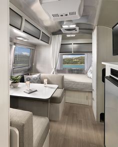 Photo 4 of 7 in Airstream’s New Bambi Trailer Targets Newcomers at $49K - Dwell Airstream Living, Airstream Bambi, Airstream Interior, Airstream Renovation, Kombi Home, Van Conversion Interior, Built In Refrigerator, Vintage Airstream, Campervan Interior