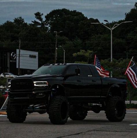 Black Big Trucks, Jacked Up Ram Trucks, Black Jacked Up Trucks, Jacked Up Trucks Dodge, Big Truck Aesthetic, Black Lifted Trucks, Black Ram Truck, Black Truck Aesthetic, Ram Trucks Lifted