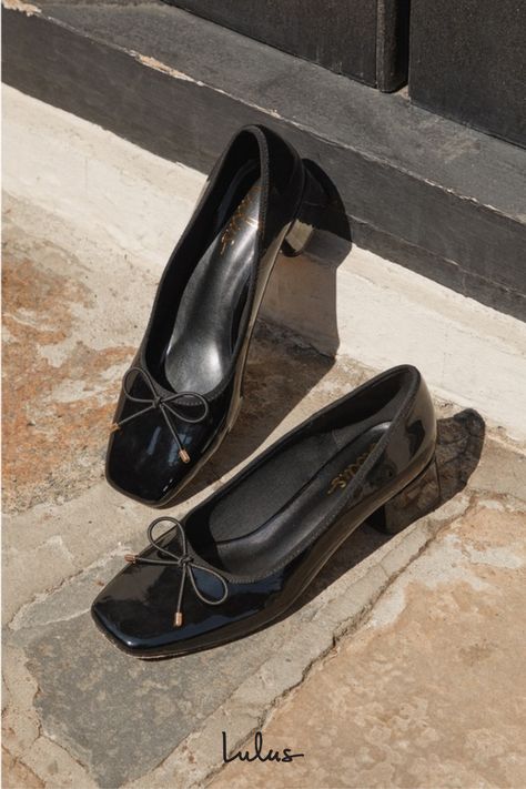 Keep things cute and simple with a classic look like the Lulus Marny Black Patent Low Heel Bow Ballet Pumps! Shiny faux patent leather shapes this season's trendiest silhouette that features a squared-toe upper with a low-cut collar and a delicate bow detail (with dainty gold aglets) that accents the vamp. The slip-on design of these timeless Mary Jane-style heels makes everyday styling oh-so easy, while a low block heel will keep you feeling comfortable! 1. 75" wrapped block heel. Lightly cushi Business Casual Mary Janes, 1.5 Inch Heels, 1 Inch Heels Shoes, Black Low Heels, Short Heel Shoes, Black Shoes For Women, Everyday Heels, Ballet Heels, Black Heels Low