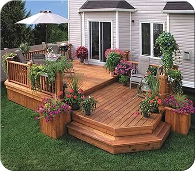 This two-level deck design creates an eating area and a sitting area; a popular design for entertaining groups of friends and family. | fenceall.com Two Level Deck, Veranda Design, Outdoor Improvements, Tiered Deck, Patio Deck Designs, Deck Designs Backyard, Decks Backyard, Diy Deck, Backyard Deck