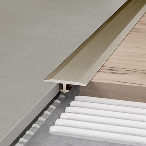 Schluter Systems Vinpro-T Brushed Nickel 1-in T x 1-in W x 98.5-in L Anodized Aluminum T-moulding in the Floor Moulding & Trim department at Lowes.com Schluter Systems, Floor Transition, Floor Moulding, Anodized Aluminum, Moldings And Trim, The Floor, Brushed Nickel, Trim, Flooring