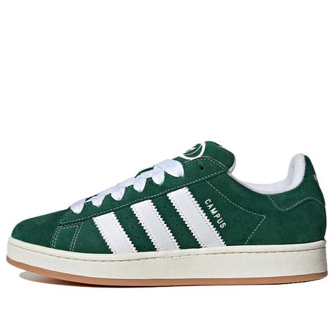 The Adidas Originals Campus 00S 'Dark Green Gum' is an iconic silhouette with a stylish and modern design. The upper is crafted with a durable material, while the sole is made with a comfortable and long-lasting material. This sneaker is perfect for everyday activities and work, providing you with a comfortable experience. Inspired by the classic Campus series, this sneaker is a perfect addition to any sneaker collection. The dark green and white colorway gives the sneaker a classic and timeless Cute Adidas Shoes Women, Everyday Shoes Casual, Green Shoes Women, Campus Adidas, Jordan Vi, Air Jordan Vi, Adidas Campus 00s, Green Adidas, Adidas Shoes Women