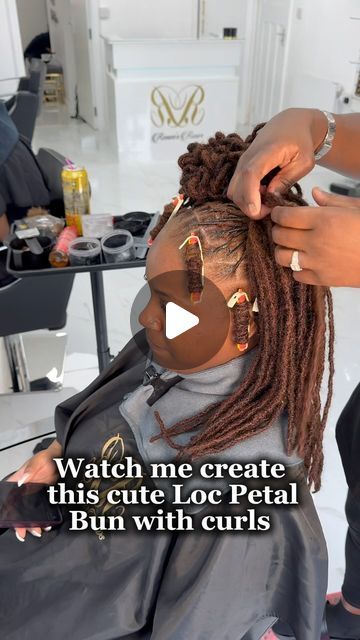 Renee |Hairstylists|Ukhair🇬🇧🇯🇲 on Instagram: "A Mini Loc petal bun tutorial on my beautiful client 🥰  What do you think about the end result??   I hope you guys found it useful coz this voiceover gave me a headache 🤕   I will get better as I go along I promise 😂  Big up my wonderful assistant starring in the background ☺️  Book your consultation today!  💎 A luxury service awaits you 🔗 in bio 👆🏾let’s talk!  #locstutorial #locstyling #tutorial #womenwithlocs #womenlocstyles #blackwomenwithlocs #naturaldreads #girlstyles #petalbuns #locpetals #twistlocs #explorepage #curlylocs #locgician" Soft Loc Bun Hairstyles, Locs With Petals, Petal Mohawk Locs, Petal Bun Soft Locs, How To Do Loc Petals, Loc Side Part Styles, Loc Styles Petals, Loc Space Bun Styles, Loc Styles For Party