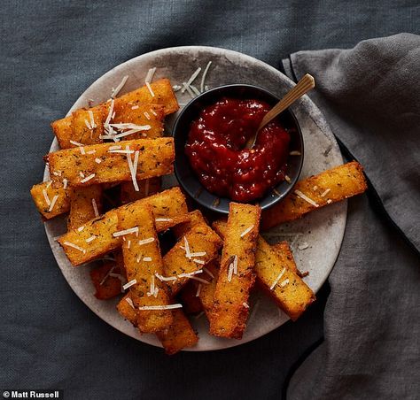 It's cocktail hour: Rosemary polenta chips  | Daily Mail Online Canapés, Rosemary Polenta, Polenta Chips, How To Cook Polenta, Tomato Chutney, Chips Recipe, Baking Tins, Vegetable Stock, Polenta