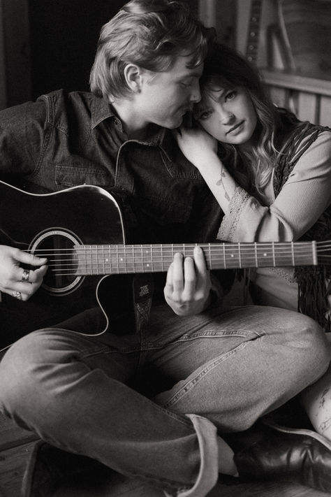 Cute musician couple play guitar together during their engagement session in a cozy cabin in the Canadian Rockies. Want to know the trick to getting candid, meaningful photos like this? Try to incorporate an activity you love doing together - and book me to capture it! Check out my website, www.ahlanibreephoto.com Musician Engagement Photos, Couple Photoshoot With Guitar, Musician Couple Photography, Guitar Engagement Photos, Engagement Photos With Guitar, Guitar Engagement Pictures, Guitar Couple Aesthetic, Music Duo Photoshoot, Bethany Aesthetic