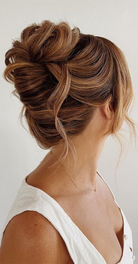 chic updos, updos, updo hairstyle, cute updo, simple updo, chignon, high updo Low Up Do Bridesmaid Hair, High Up Hairstyles For Wedding, Bun With Loose Strands, Bridesmaid Updos For Medium Hair Shoulder Length, Romantic Messy Updo, Tousled High Bun, Balayage Updo Wedding, High Messy Bun Updo Wedding, Loose Chignon Updo