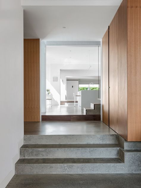 Hallway and Concrete Floor Internal brick walls and polished concrete surfaces provide thermal mass that help keep the interior spaces cool. New Modern House, Passive House Design, Eco Friendly Interior, Concrete Interiors, Concrete Houses, Passive Design, Dress Models, Concrete Stairs, Concrete Steps