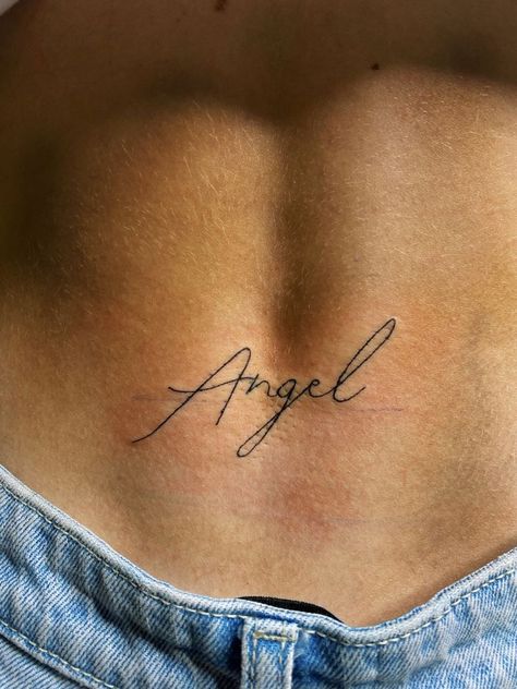 Angle Word Tattoos, The Name Angel Tattoo, Angel Word Tattoo For Women, Angel In Cursive Tattoo, Angel Energy Tattoo Cursive, Angel Written Tattoo, Angel Script Tattoo, Angel Cursive Tattoo, Angel Hip Tattoo