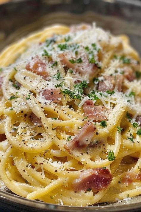 Spaghetti Carbonara is a delicious and satisfying choice for any mealtime! 🍝🥓 Made with creamy eggs, savory pancetta, and perfectly cooked pasta, this dish is a delightful blend of rich and comforting flavors. Quick to prepare and bursting with hearty goodness, Spaghetti Carbonara is perfect for a satisfying dinner or special treat. Indulge in this classic Italian favorite today! 😋🌿 #SpaghettiCarbonara #ItalianCuisine #ComfortFood #HeartyMeals Carbonara Pizza, Chicken Carbonara, Creamy Eggs, Cooked Pasta, Italian Favorites, Carbonara Pasta, Spaghetti Carbonara, Hearty Meals, Classic Italian