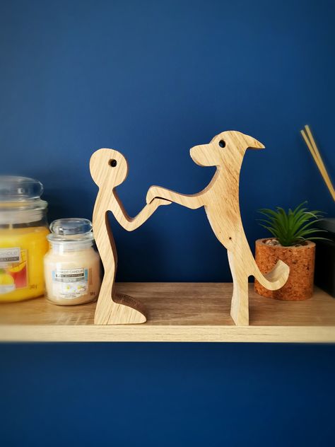 This beautiful wooden statue emphasises the love between man and dog, and would make a lovely gift to those with a four-legged friend to showcase the bond they have! It makes for a lovely centre piece on a mantle and will be a talking point for your guests. Made of solid oak, this sturdy piece will make a great addition to your home. Please note, colour, weight and dimensions may vary due to timber supply. Tall Dog, Wood Log Crafts, Tallest Dog, Scroll Saw Patterns Free, Small Woodworking Projects, Wood Dog, Wooden Statues, Wood Logs, Man And Dog