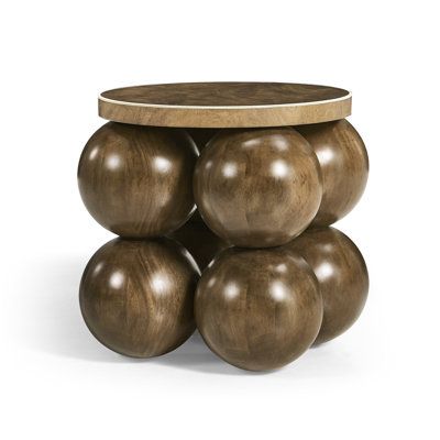 Elevate your home with the perfect imaginative design and contemporary aesthetics through the orb accent table. With its captivating spheres and luxurious finish, it becomes the centerpiece that seamlessly combines modern elegance and sophistication. The table's solid wood-stacked orbs form a charismatic foundation that fuses art and functionality. These orbs create a unique and eye-catching design that adds personality to the piece. The faux bone inlay creates a subtle visual contrast against t Abstract Coffee Table, Round Accent Table, Contemporary Side Tables, Modern End Tables, Solid Wood Coffee Table, Modern Side Table, Bone Inlay, Coffee Table Wayfair, Solid Mahogany