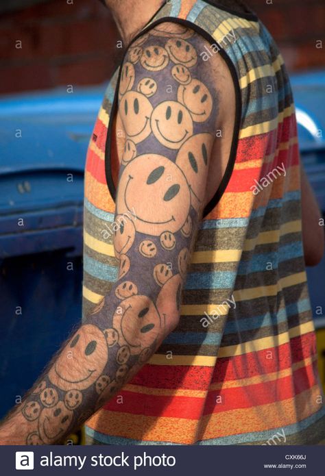 An arm tattooed with smiley faces Stock Photo - Alamy Smile Face Tattoo, Emoji Tattoo, Smiley Face Tattoo, Smile Tattoo, Hippie Tattoo, Watch Tattoos, Bling Wallpaper, Face Tattoos, Discreet Tattoos