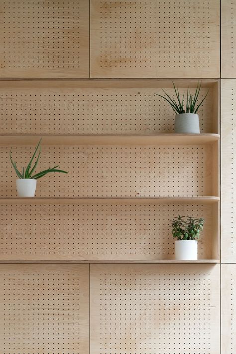 We proposed an integrated bespoke pegboard for this Dalston creative studio. It works both as a perfect backdrop for meetings and video conferencing, as well as aiding the acoustics of the space. Design by @companyofthings Fabrication by @commissioned_by_you Photo by @claudia_agati_ Large Peg Board Wall, Pegboard Office Wall, Pegboard Furniture, Plywood Joinery, Pegboard Design, Peg Board Walls, Creative Studio Space, Clinic Interior, Clinic Interior Design