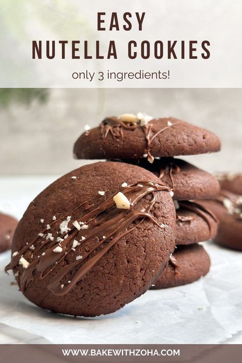 Satisfy your sweet tooth this fall and winter with these simple 3-ingredient Nutella cookies! This easy recipe requires just a few ingredients but is so delicious and so soft and chewy. Perfect for fall desserts, winter sweet treats, or as a quick and satisfying dessert for any occasion. Whether it’s for Thanksgiving, Christmas, or a dinner party, these Nutella cookies will be a hit. Visit bakewithzoha.com for the complete recipe! Nutella Holiday Recipes, Nutella Truffles 3 Ingredients, Cookies With Nutella Filling, Easy Bake Cookies 3 Ingredients, Few Ingredient Dessert Recipes, Gluten Free Nutella Cookies, 3 Ingredient Nutella Cookies, Recipes With Nutella Easy, Easy Baking Recipes Desserts 3 Ingredients Simple