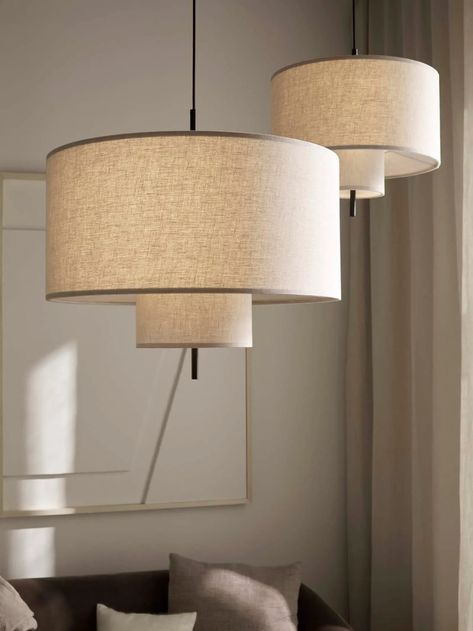 Contemporary linen pendant light shades | A light beige & white showroom makeover for New Works | These Four Walls blog Fabric Lantern, Linen Pendant, Fabric Pendant, New Works, Fabric Lampshade, Design Studios, Cylinder Shape, Modern Fabric, Fabric Shades