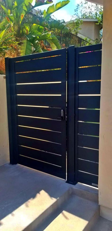 Black Aluminum Entry Gate | MulhollandBrand.com Side Gate Doors, Back Gate Ideas Entrance, Backyard Entry Gates, Iron Side Gate Ideas, Side Door Fence Gate Ideas, Side Fence Door Entrance Ideas, Front Yard Gates And Fences Modern, Metal Side Door Gate, Black Aluminum Fence Gates