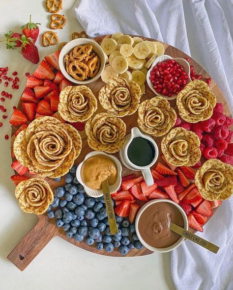 Ashley Pellizzaro on Instagram: "Crêpe Roses Platter! Yay or Nay? 🥞🍫🥜 I know people tend to have a favourite between crepes, pancakes and waffles but I kinda love them all! Have you seen salami roses on cheese or charcuterie boards? Well, use the same technique with crepes and create a fabulous breakfast or brunch board! The best thing about this is you can do a sweet or savoury option! What are your favourite toppings? . . . #breakfastboard #breakfastplatter #grazingplatter #plattergoals #gr Breakfast Charcuterie Letters, Pancake Breakfast Board, Crepe Charcuterie Board, Crepes Board, Pancake Charcuterie Board Ideas, Pancake Board Ideas, Breakfast Graze Board, Crepe Board, Waffle Charcuterie Board