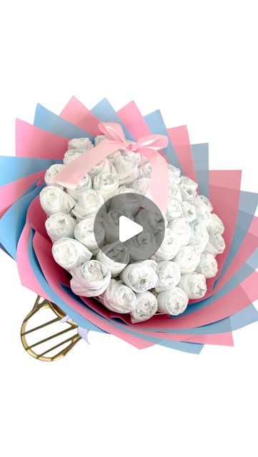 @manos.potosinas on Instagram: "A great & affordable gift to make 🌸🍼  • • • #babygift #babygiftideas #diy #dollartreecrafts #diaperbouquet #babyshowerideas #babyshower #austintx #florist #atxflorist #austinflorist" How To Make A Diaper Bouquet, Gender Reveal Bouquet Flowers, Baby Bouquet Diy Gift, Baby Shower Bouquet Ideas, Diaper Bouquet Diy, Diaper Bouquet Tutorial, Bouquet Diy Gift, Baby Shower Bouquet, Baby Sock Bouquet