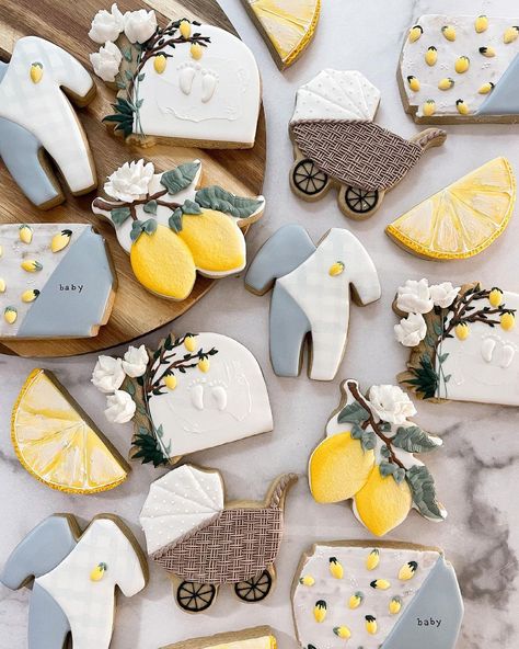 Renee Terry on Instagram: “The sweetest little lemon baby shower set ever! The idea here was to keep lemons as the main attraction with splashes of dusty blue thrown…” Main Squeeze Gender Reveal, Lemons Baby Shower Ideas, Lemon Squeeze Baby Shower Theme, Lemon Blue Baby Shower Theme, Our Main Squeeze Baby Shower Theme, Mommy’s Main Squeeze, Italy Theme Baby Shower Ideas, Little Lemon Baby Shower Theme, Summer Baby Shower Cookies