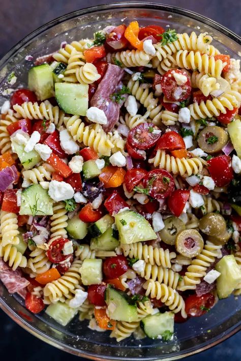 This Greek Pasta Salad Recipe is an easy and flavorful side dish idea. Everyone loves a good pasta salad recipe and this Mediterranean Pasta Salad is a nice twist to plain pasta salad. #greekpastasalad #pastasaladrecipes #greekrecipes #mediterraneanrecipes #summerrrecipes #pastasalad Cold Mediterranean Pasta Salad, Greek Macaroni Salad, Salami Pasta Salad, Plain Pasta, Unique Pasta Salad, Twisted Pasta, Macaroni Salads, Greek Salads, Good Pasta