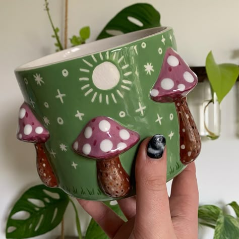 Throwback to this super cute green mushroom plant pot that is still awaiting a home (and a plant to holdddd) ✨🎨🌱🌸 Available on my website ♥️✨link in bio 🥰✨ @maycocolors on @hobbyceramicraft 🎨✨🐛 #art #artist #ceramics #pottery #painting #illustrator #ceramicstudio #potterytiktok #potterypainting #painter #mushroom #plantpot Pottery Painting Mushroom, Mushroom Pottery Painting, Mushroom Plant Pot, Mushroom Pottery, Painting Mushroom, Ceramic Mushrooms, Green Mushroom, Mushroom Plant, Ceramics Pottery