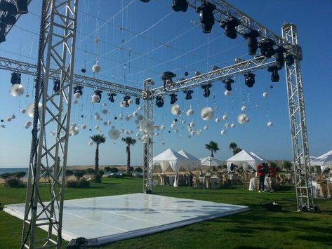 Lawn Designs, Truss Design, Gatsby Party Decorations, Sangeet Decor, Lighting Truss, Sangeet Night, Truss Structure, Dance Floor Wedding, Outdoor Party Lighting