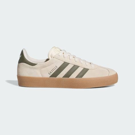 A skateboarding version of the classic adidas Gazelle sneakers, these shoes have higher foxing tape and a super grippy outsole. A double-layered toe adds durability, while a molded sockliner offers an elevated fit. Sneakers 2024 Fall, Mens Shoes 2024 Trends, Casual Shoes For Men Sneakers, Shoes With Dresses, Adidas Gazelle Green, Suede Adidas, Beige Adidas, Fall Sneakers, Shoes Beige