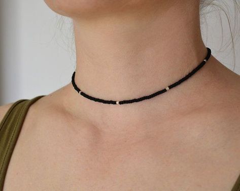 Your place to buy and sell all things handmade -  Beaded Choker – Silver 925 beads – Short necklace – Sead bead necklace – Black beaded choker – Chocker – Chocker necklace – Simple necklace – Mens necklace – Unisex necklace – Unisex Jewelry – Boho – Bohemian – Black necklace – Short necklace  This tiny short choker necklace is made from opaque black sead beads, silver 925 beads ans silver clasp. Its tiny and delicate. Unisex model, may be as mens necklace too. You received the similar item.  Le Kalung Choker, قلادات متدلية, Beaded Jewelry Necklaces, Indie Jewelry, Chocker Necklace, Mens Necklace, Black Beaded Jewelry, Beads Bracelet Design, Unisex Necklace