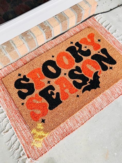 WANT THE CHEETAH UNDERLAY MAT If you desire The Cheetah rug its an 24x36 underlaying rug that can be found at hobby lobby. About your doormat. 18x30 Spooky Season Doormat My doormats come with a slip resident backing, with a natural brown coir front. This coir fronting is great for collecting dirt and grim but in a stylish way. To ensure long lasting results i do recommend that you keep your doormat in a dry, covered area is ideal. To clean, simply shake or vacuum away any debris. What is the it Spooky Rugs Diy, Halloween Door Mat Painting, Fall Doormat Painting, Fall Welcome Mat Diy, Halloween Door Mats Diy, Diy Halloween Welcome Mat, Fall Diy Doormat, Halloween Door Mat Diy, Fall Doormat Ideas