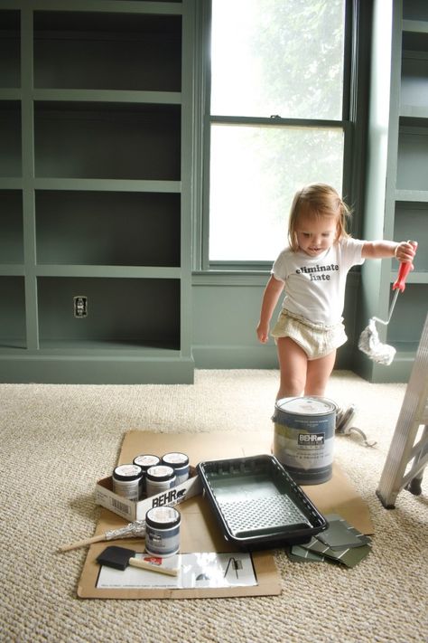 Behr Pinecone Hill Green, Dark Wall Playroom, Dark Green Office Paint Colors, Behr Green Accent Wall, Dark Green Office Built Ins, Basement Accent Wall Color, Green Painted Bookshelves, Pinecone Hill Behr, Behr Paint Dark Green