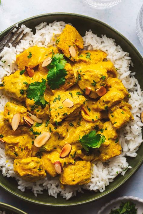 Mango Curry Chicken is a flavorful dish combining tender pieces of chicken with a rich and aromatic curry sauce infused with the sweet and tangy flavor of mangoes! Enjoyed with fluffy rice or warm naan, this is a wonderful weeknight dinner the whole family will love. Mango Dinner Ideas, Indian Mango Chicken, Tandoori Chicken Curry, Chicken Curry With Rice, Mango Chicken Recipes, Yellow Curry Chicken, Boozy Recipes, Chicken With Mango, Mango Chicken Curry