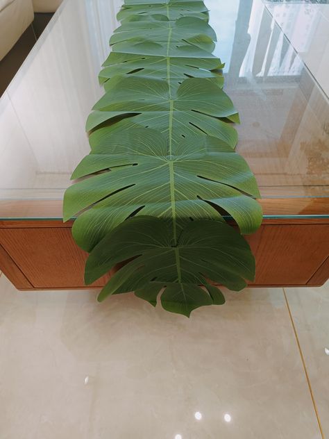 PRICES MAY VARY. Arijorja Products Include: 2 artificial palm leaf Table Runners。 Artificial Palm Leaves Table Runners: These are not individual artificial tropical palm leaves; But all the blades are connected to each other, forming a whole Table Runners; The size of a single leaf is approximately 13.4 x 11.8 inches; The length of the entire tablecloth is 72 inches, which is very suitable for Luau Theme Party and tropical Hawaiian themed party table decoration. Material: The product is made of Island Theme Party Decorations, Tropical Retirement Party, Homecoming Decorations Hallway, Palm Tree Party, Palm Leaves Table Runner, Hawaiian Cowboy, Lion King Party Decorations, Greek Party Theme, Hawaii Decorations