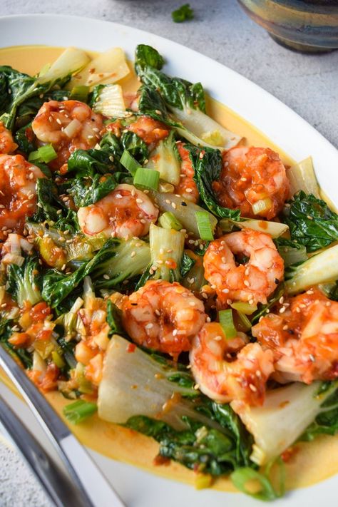 Close up shot of an oblong yellow and white dish filled with garlic shrimp and bokchoy. Baby Bokchoy Shrimp, Roasted Baby Bokchoy Recipes, Baby Bokchoy Asian, Shrimp With Broccoli Chinese, Bokchoy Stirfry Shrimp, Nativity Fast Recipes, Bock Choy Recipe, Shrimp Bokchoy Stirfry Easy, Boc Choy Recipe