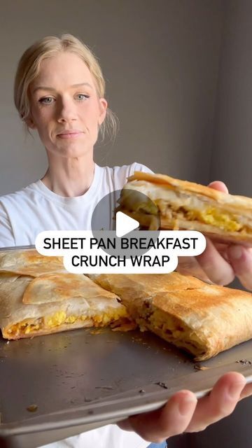 Andrea on Instagram: "Sheet Pan Breakfast Crunchwrap

1. Take a sheet pan and spray with a little oil.
 Lay 5 burrito tortillas down with one in the  middle and the edges hanging off.(video before this for reference)
2. Now spread Taco Bell chipotle creamy sauce on the first layer.
3. Take 8 cooked hash brown patties for the next layer.
4. Top with cooked eggs.
5. Now top with one pound of cooked sausage or bacon.
6. Last layer will be 1 1/2-2 cups of shredded cheese. 
7. now take 3 more burrito tortillas and lay them on top wrapping them under a bit too.
8. Spray top with oil.
9. Lay another cookie sheet on the top.
10. Bake at 450 degrees for 15-20 minutes.
11. Enjoy!!

Ingredients:

8 burrito tortillas 
Taco Bell chipotle creamy sauce
8 hash brown patties
4-8 eggs
1 pound sausage or bac Taco Bell Breakfast Burrito, 5 Layer Burrito Taco Bells, Tortillas Breakfast Ideas, Sheet Pan Breakfast Quesadilla, Egg Tortilla Breakfast, Tortilla Breakfast Ideas, Bacon Breakfast Ideas, Healthy Breakfast Wraps, Taco Bell Breakfast