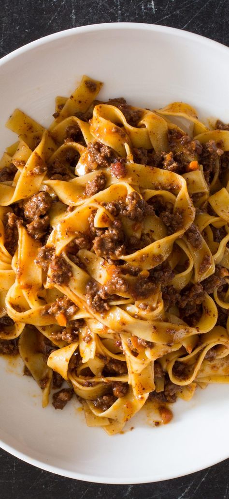 Weeknight Tagliatelle with Bolognese Sauce. Half a dozen meats and hours of pot watching make a lush, deeply savory version of this Italian ragu. We wanted those results with fewer ingredients in half the time. Easy Bolognese, Pasta With Meat, Tagliatelle Bolognese, Bolognese Pasta, Italian Recipes Traditional, America's Test Kitchen Recipes, Bolognese Sauce, Cooks Illustrated, Americas Test Kitchen